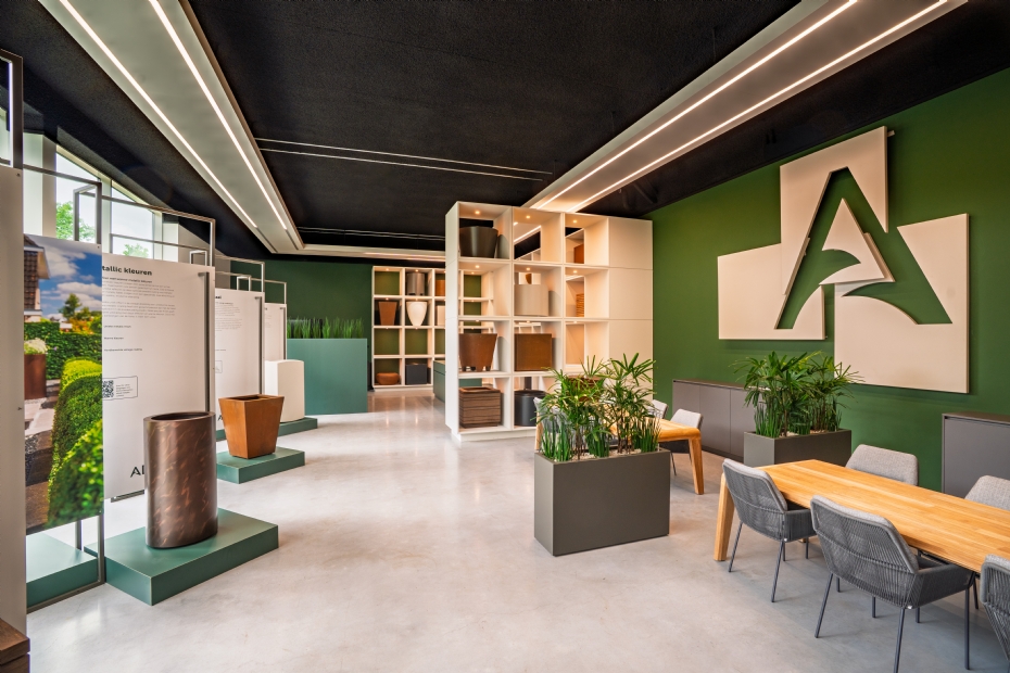 The photo shows the education center where landscapers can review plans with their clients, see and feel the materials, and learn about all ADEZZ products.